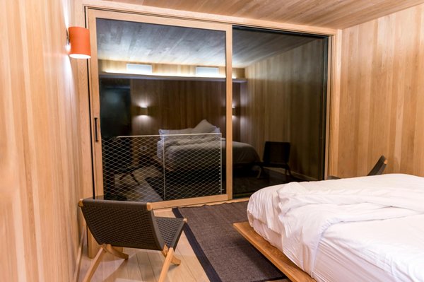 How can you incorporate vertical gardening into small UK spaces?